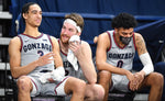 Gonzaga Bulldogs forward Drew Timme (2) and guard Andrew Nembhard (3) laugh from the bench during the second half of a college basketball game on Feb. 20, 2021, at McCarthey Athletic Center in Spokane, Wash. Gonzaga won the game 106-69. Tyler Tjomsland/The Spokesman-Review