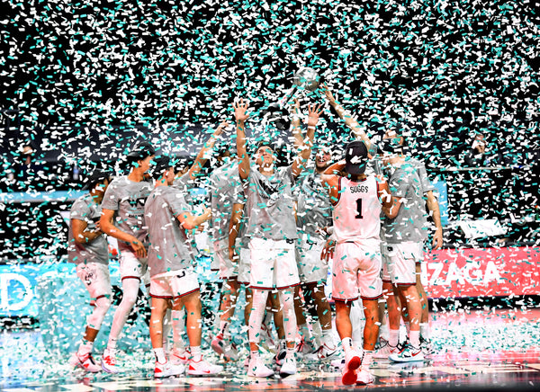 The Zags celebrate their West Coast Conference Tournament Championship win over BYU, March 9, 2021, at the Orleans Arena in Las Vegas. Colin Mulvany/The Spokesman-Review