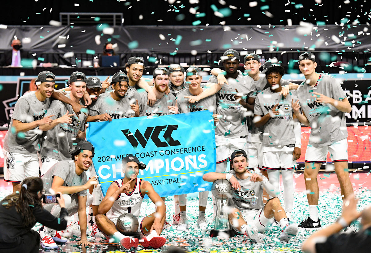 The Zags celebrate their West Coast Conference Tournament Championship win over BYU, March 9, 2021, at the Orleans Arena in Las Vegas. Colin Mulvany/The Spokesman-Review
