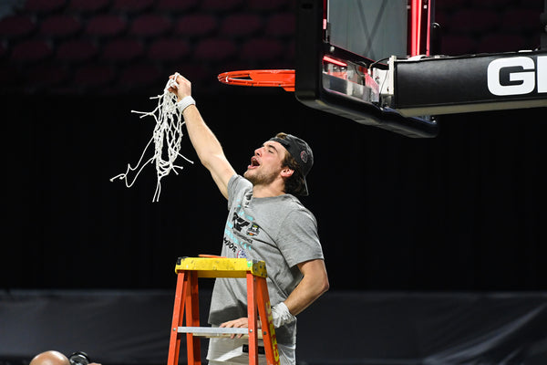 Gonzaga forward Corey Kispert (24) cuts the last rung on the net after the Zags beat BYU for the WCC championship in Las Vegas. Colin Mulvany / the Spokesman-Review