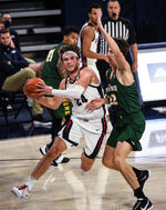 Gonzaga forward Corey Kispert (24) heads into the key as San Francisco forward Dzmitry Ryuny (22) defends during the second half of an NCAA college basketball game, Jan. 2, 2021, in the McCarthey Athletic Center. Colin Mulvany/The Spokesman-Review
