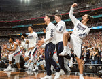 The Gonzaga bench, including Rem Bakamus, right, roars with delight after the Zags score a 3-point shot against South Carolina, April 1, 2017, in their NCAA Final Four game in Phoenix. Dan Pelle / The Spokesman-Review