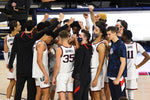 The Zags circle up after defeating St. Mary’s 87-65 during a college basketball game, Feb. 18, 2021, at the McCarthey Athletic Center. Colin Mulvany/The Spokesman-Review