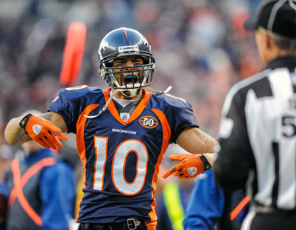 Denver Broncos wide receiver Jabar Gaffney (10) argues a call with side judge Jimmy DeBell, right, against the Oakland Raiders on Dec. 20, 2009, at Invesco Field at Mile High. The Raiders score a touchdown with 39 seconds left in regulation and win 20-19. Cyrus McCrimmon / The Denver Post