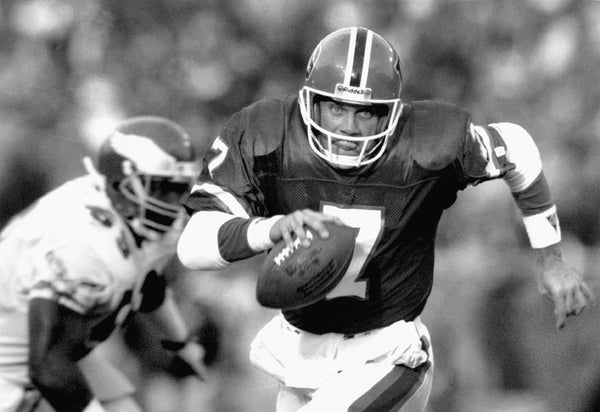 John Elway scrambles for yardage in the second quarter and scores against Philadelphia, Oct. 29, 1989. Jerry Cleveland / The Denver Post