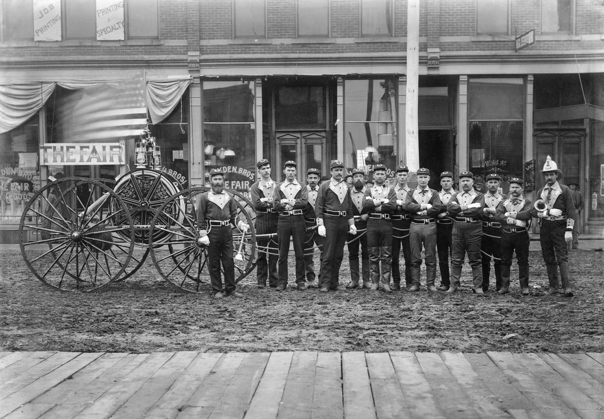 Grand Island Volunteer Fire Department, Alexander Hose Company No. 4, along the 100 block of East Third Street, circa 1891. The fireman on the far left is likely A. D. Owens, the hose company’s foreman. The fireman at the far right is likely Department Chief Peter Heintz. Courtesy Stuhr Museum of the Prairie Pioneer/Leschinsky