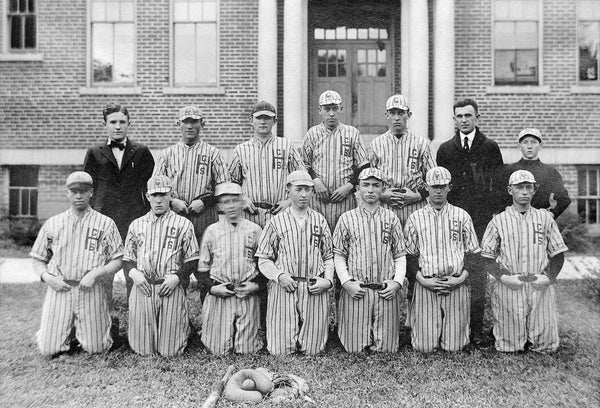 Greenville High School baseball team, 1922. Kneeling, from left: Richard Williams, Wesley Harvey, Douglas West, Frank Harrington, Berry Jenkins, Robert Forbes, Cecil Satterthwaite. Standing: Wyatt Brown (manager), Jimmie Barber, Zero Brown, Fernando Satterthwaite, C.B. West, Herman H. Duncan, Cecil Bilbro. Photograph used in the 1922 The Tau, yearbook of Greenville High School. Courtesy East Carolina University Special Collections / #0921-b1-fa-i2
