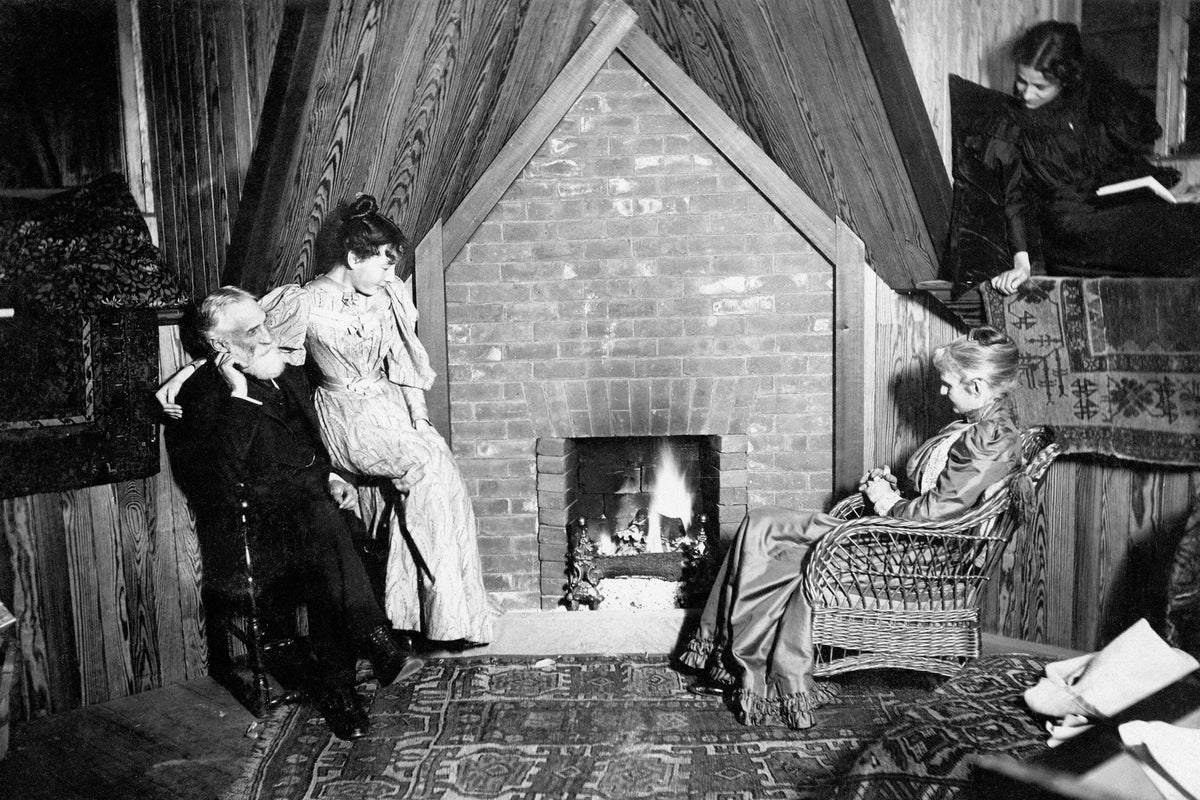 George Warner, friend Harriet W. Foote Taylor, wife Elisabeth Gillette Warner, and niece Margaret Warner Morley, in the Gillette House attic, Forest Street, Nook Farm, Winter 1893–94. Courtesy Harriet Beecher Stowe Center
