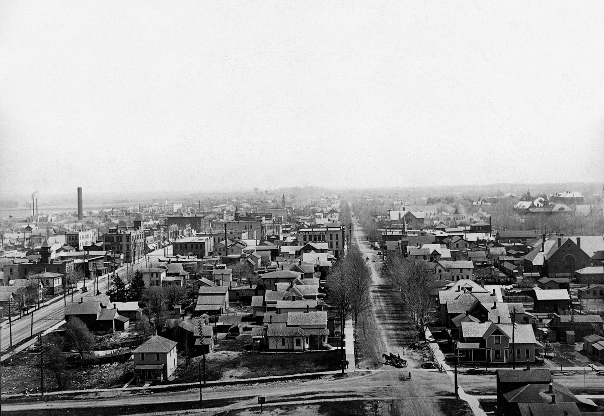 Downtown Holland from the Cappon-Bertsch Tannery looking east, circa 1902. At bottom is the present Pine Avenue, with Eighth Street on the left and Ninth Street on the right. Note the unpaved streets and the horse-drawn wagon on Ninth Street. Courtesy The Harrington Collection
