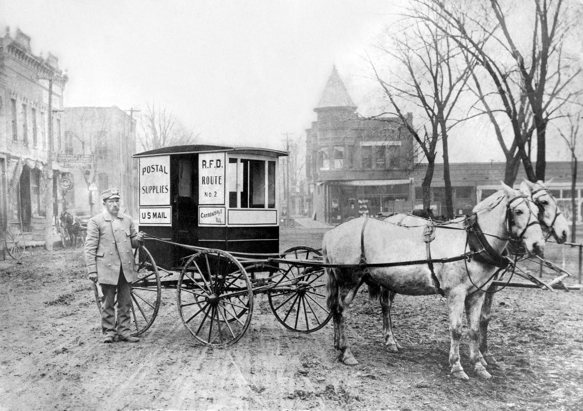 A mail carrier near the intersection between Illinois Avenue and Jackson Street in Carbondale, circa 1905. Courtesy City of Carbondale