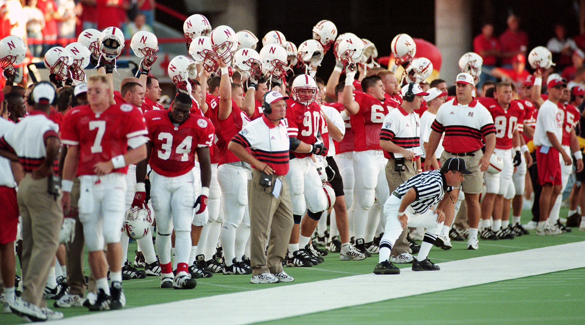 Players on the Nebraska sideline gear up to play Kansas State on Oct. 4, 1997, at Memorial Stadium. The 56-26 victory was the Huskers’ 29th straight win against the Wildcats. Courtesy Lincoln Journal Star