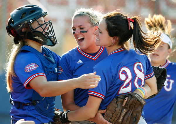 KU players celebrated winning the 2006 Big 12 Softball Championship at ASA Stadium in Oklahoma City.
