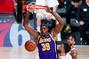 Dwight Howard makes this slam count against the Portland Trail Blazers. It’s clearly a low-risk shot, accounting for a field goal percentage of 68 during the playoffs. Ashley Landis / Associated Press