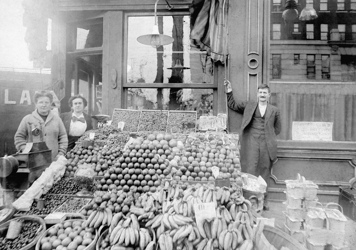 Palmyra Longinotti (from left), Rose Wolfe and owner Bartholomew Longinotti in front of Longinotti’s Fruits and Confectionery at 534 Lackawanna Ave., Scranton, circa 1913. Courtesy Mark A. Cruciani