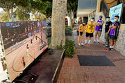 During the coronavirus, fans had to find different ways to watch the Lakers, and all sports. Here, masked basketball fans watch from the sidewalk on a monitor outside the Spin Lounge in the Historic Uptown of Whittier. Gary Coronado / Los Angeles Times