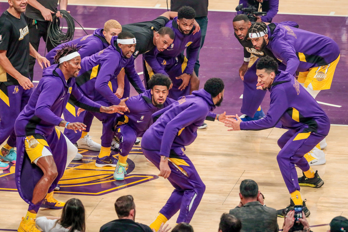 There is a certain comfort in traditions, even if it is as simple as this little team bonding exercise the Lakers do before every game. Robert Gauthier / Los Angeles Times