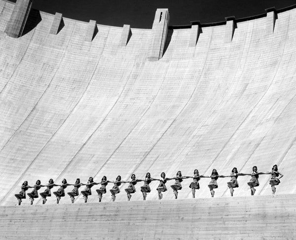 The Las Vegas High School Rhythmettes, a precision dance and drill team, perform a routine with the top of Hoover Dam behind them, 1957. The routine was part of a Warner Brothers featurette titled “Howdy, Podner.” Courtesy Evelyn Stuckey Collection c/o Cheryl Purdue, UNLV University Libraries Special Collections & Archives