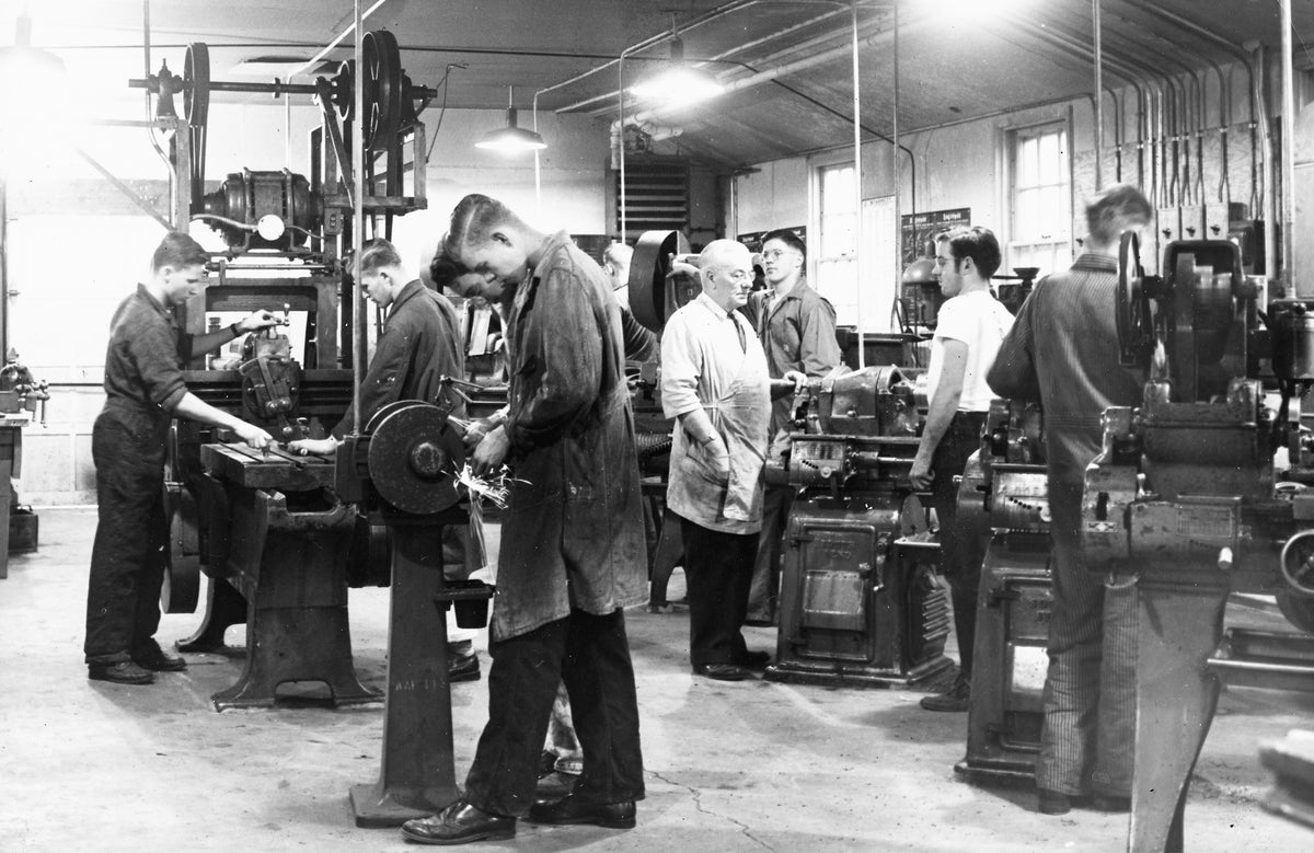 High school boys learning to work with machines and tools in the high school machine shop, formerly used by the Northern Idaho College of Education, November 11, 1951. The students here are learning to work with lathes, drill presses, grindstones and other equipment under the instruction of Mr. William Frick. Courtesy Lewiston Morning Tribune