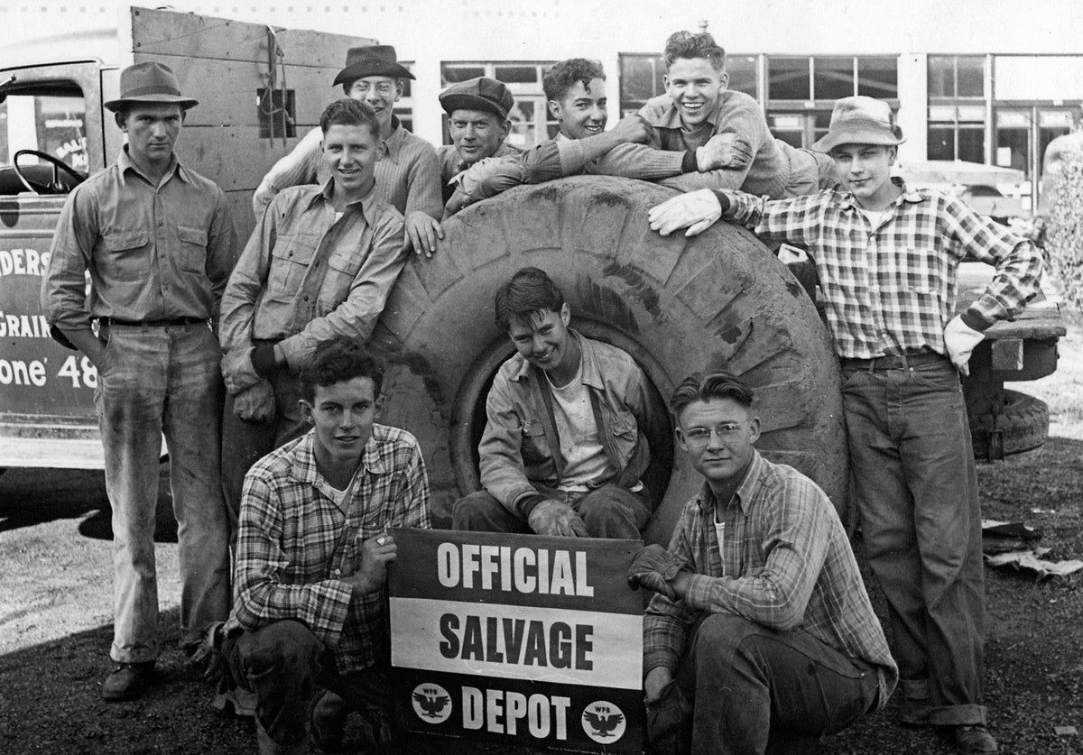 Young men at the Official Salvage Depot, October 1942. Front row, from left: Bill Mitchell, Earl Todd, LeRoy Roberton. Back row: unidentified, Bob Keller, Harrison Weatherford, Ron Wallis, Rex McReynolds, Ken Codzad, Wilbur Senders. Courtesy Albany Regional Museum