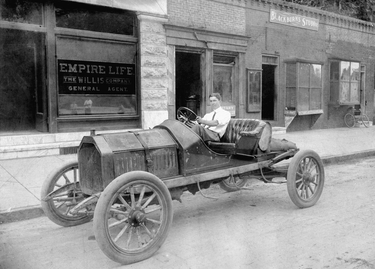 Willard Parrish parked in front of Empire Life and Blackburn photography studio in Valdosta, circa 1910. Lowndes County Historical Society and Museum