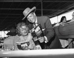 TV stars Lucille Ball and Desi Arnaz enjoy opening day at the Del Mar racetrack on July 24, 1957. They were part-time residents in Del Mar. CourtesySan Diego History Center, UNION-TRIBUNE COLLECTION (#UT85:216)