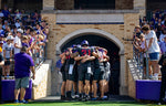 The TCU football team gathers to pray together before their game against OSU at the Amon G. Carter Stadium in Fort Worth on Oct. 15, 2022. (Madeleine Cook / Fort Worth Star-Telegram)