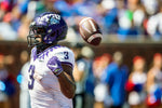 TCU Emari Demarcado tosses the football behind him after scoring a touchdown on Saturday, Sept. 24, 2022, at the Gerald Ford Stadium in the Southern Methodist University in Dallas, Texas. (Madeleine Cook / Fort Worth Star-Telegram)