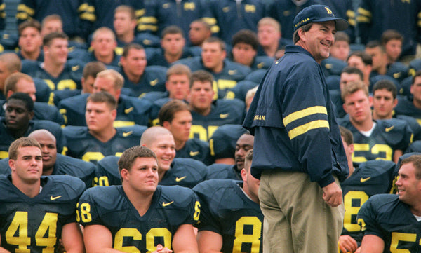 University of Michigan head football coach Lloyd Carr prepares his men for one of the hardest assignments of the 97 season, the team photograph, being shot  at the "the big house" in Ann Arbor Thursday morning. David P. Gilkey / Detroit Free Press