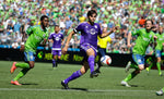 Orlando City goalkeeper Tally Hall holds the ball in the second half against Seattle. He and the Lions surrendered four goals to the Sounders. Ted S. Warren / Associated Press