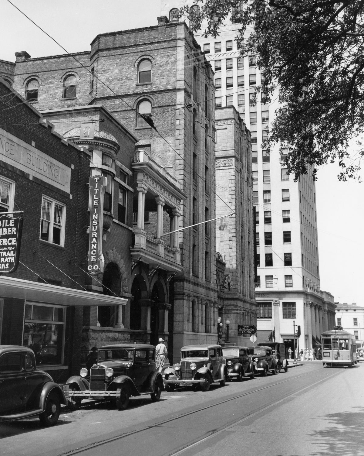 A view of the north side of St. Francis Street in Mobile, looking east from Title Insurance Comapny, circa 1938.