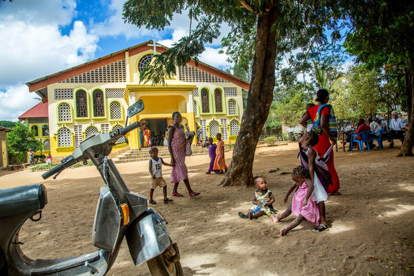 Families and children wait for the start of Sunday Mass at St. Francis Xavier R.C. Church in Malindi, Kenya. The church, which seats 700, is named for the Jesuit missionary St. Francis Xavier, who passed through Malindi in the 16th Century.  For the Philadelphia Inquirer / Georgina Goodwin