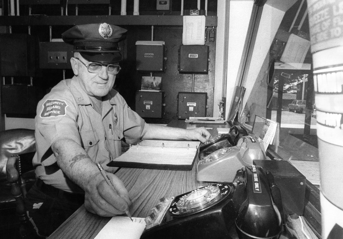 Joseph Rheault of Manchester Security Services on the job at NH Insurance Co. in 1983. Courtesy Union Leader Archives