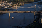 The Marquam Bridge in the forground allows only vehicles while the Tilikum Crossing, middle, allows no cars or trucks. Bruce Ely/The Oregonian/OregonLive