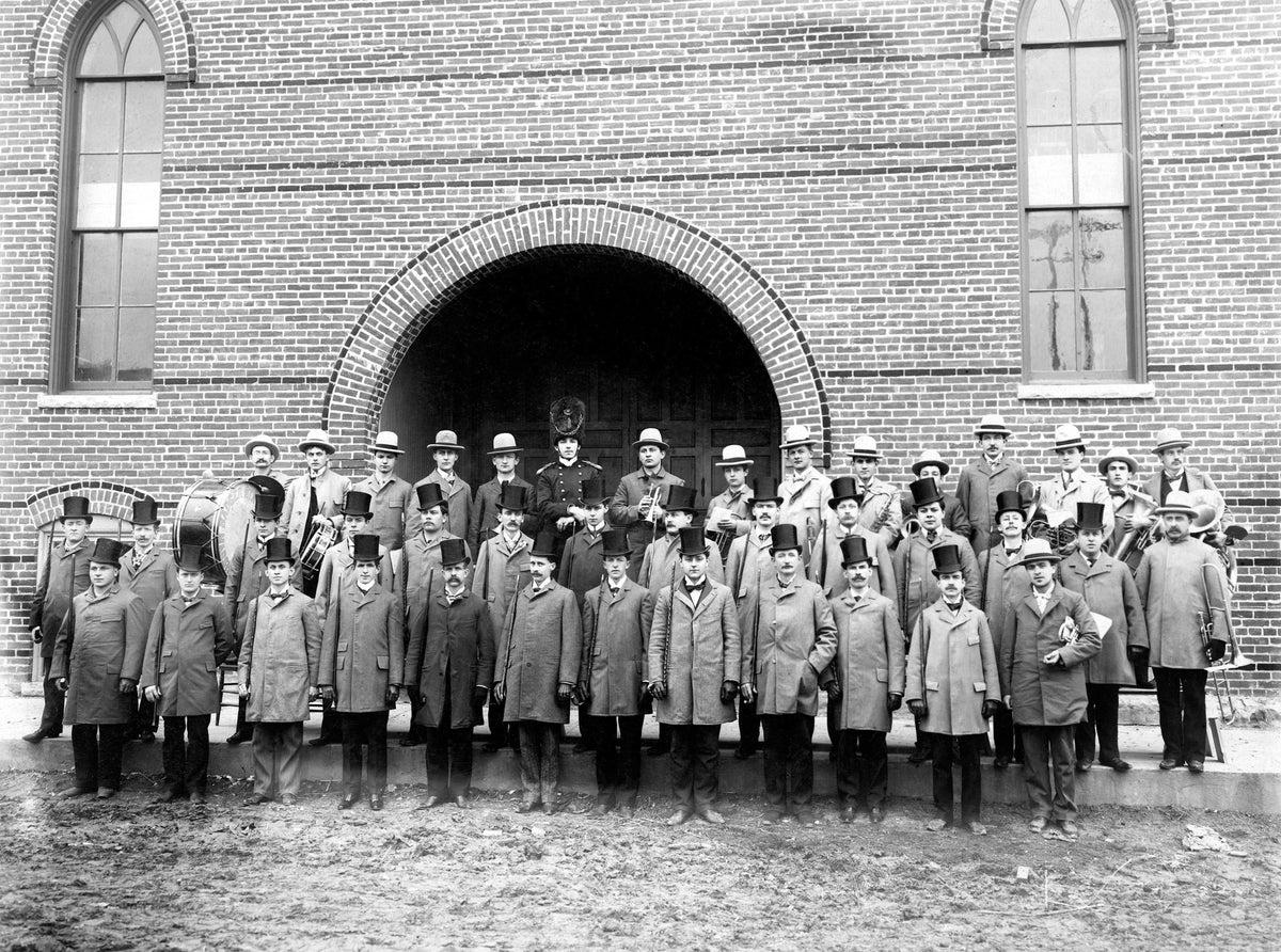 A group of Elks minstrels in front of the Adler Opera House, 107 East Second Street, 1898. Courtesy North Wood County Historical Society / #F102.16-1