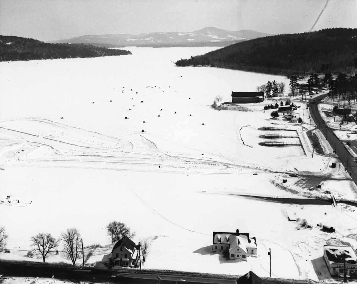 Meredith Bay, looking southeast, circa 1967. Bob houses and to the left, the jalopy car race track can be seen on the ice. John Edgar