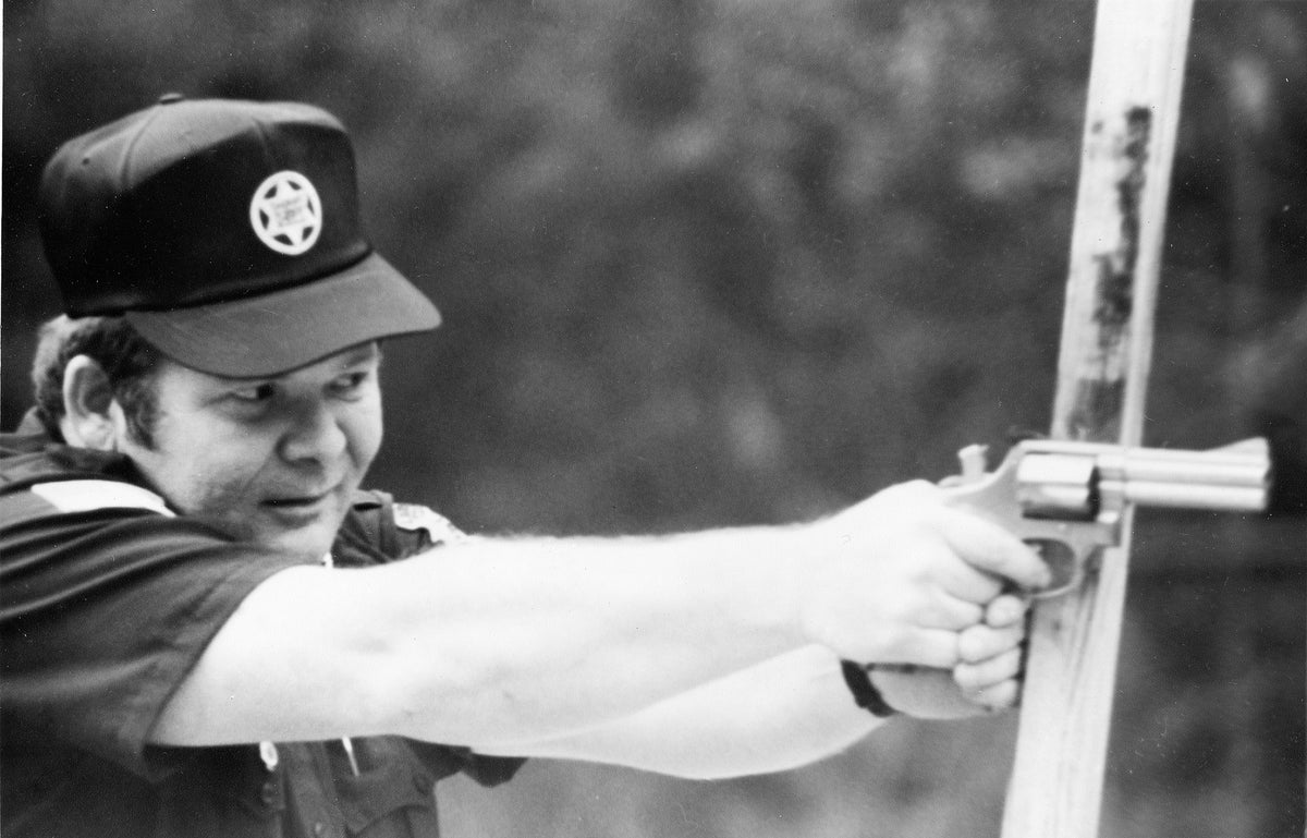 Lauderdale County Sheriff's Deputy, Tommy Long, prepares to shoot at a target during qualification exercises at the Police fire range near Bonita Reservoir in 1983. He was a well-known community leader until his death on November 13, 1994. Long help found LAWS (Ladies Auxilary for Women Shooters) in Lauderdale County. He was an accomplished musician having played lead guitar in B.J. Thomas' band. He was also Man of the Year in 1983-84