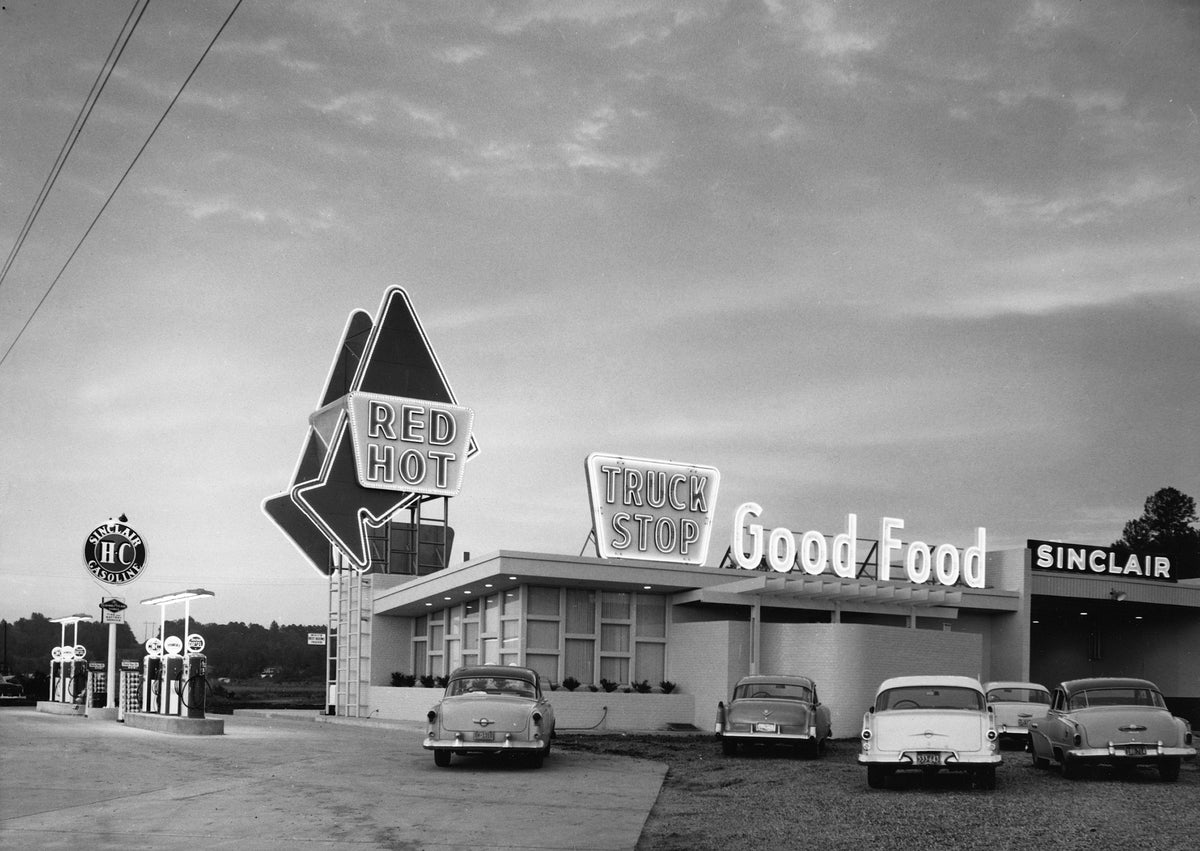 The Red Hot Truck Stop on Highway 11 and 80, September 1955. The truck stop was originally built in 1954 and was first run by Eugene and Thema Carr and son, D. W. Carr and his wife, Ruth. It was the stopping point for truck drivers headed through Meridian on their way to New Orleans, Birmingham, and Atlanta. Later, in 1999, the Carnegie Museum of Natural History took interest in the site as several fossils were unearthered around the area. The discoveries were so significant that the National Geographic Soc