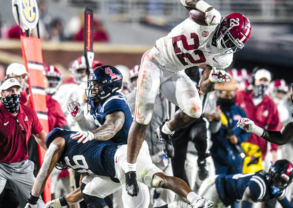 En route to 248 all-purpose yards, Najee Harris soared over Ole Miss linebacker MoMo Sanogo for a 14-yard catch-hurdle-run play. On 23 carries, Harris rushed for 206 yards and five touchdowns. They covered five, 33, three, 16 and 39 yards. With three receptions, Harris gained 42 yards. BRUCE NEWMAN/USA TODAY SPORTS