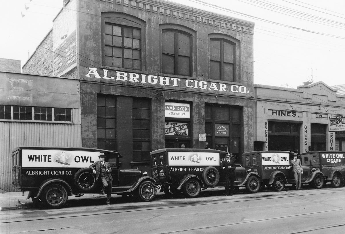 White Owl delivery wagons in front of Albright Cigar Company warehouse at 111 North Royal Street, Mobile, 1920s.