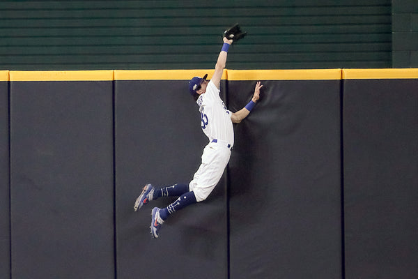 This was the moment that most will remember from this divisional series against the San Diego Padres as Cody Bellinger goes more than high to rob Fernando Tatis Jr. of a home run in the seventh inning. Robert Gauthier / Los Angeles Times