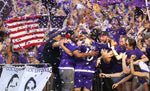 Kaká jumps into the stands to celebrate his goal against Columbus, which ignited a crowd of more than 31,000 at the Citrus Bowl. Stephen M. Dowell / Orlando Sentinel