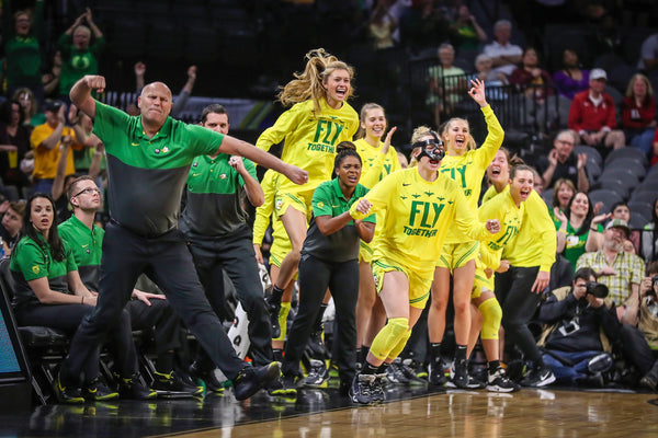 The Oregon bench celebrates during the first half as the No. 1 seed Oregon Ducks face the No. 4 seed Arizona Wildcats in the semifinals of the Pac-12 women's basketball tournament on March 7, 2020, at Mandalay Bay Events Center in Las Vegas. Courtesy Serena Morones, The Oregonian/OregonLive