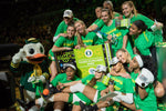 Oregon players celebrate after the No. 1 seed Oregon Ducks beat the No. 3 seed Stanford Cardinal 89-56 in the championship game of the Pac-12 women's basketball tournament on March 8, 2020, at Mandalay Bay Events Center in Las Vegas. Courtesy Serena Morones, The Oregonian/OregonLive