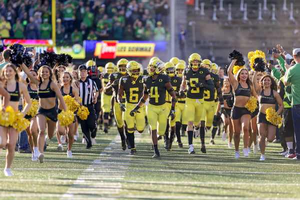 The Oregon Ducks take the field ahead of their Oct. 5 home game against the California Golden Bears. Oregon overcame early mistakes to win 17-7. Courtesy The Oregonian / Sean Meagher