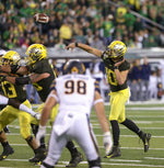 Oregon quarterback Justin Herbert throws to the outside during the Ducks’ 17-7 home victory against the California Golden Bears. Courtesy The Oregonian / Sean Meagher