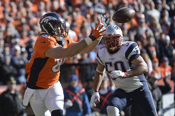 DENVER, CO - JANUARY 24: Owen Daniels (81) of the Denver Broncos makes a catch and runs into the end zone for a touchdown in the first quarter. The Denver Broncos played the New England Patriots in the AFC championship game at Sports Authority Field at Mile High in Denver, CO on January 24, 2016. (Photo by AAron Ontiveroz/The Denver Post)