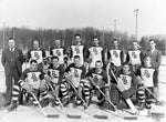 Penn State Varsity Hockey Team, 1940-41. Standing: Dr. A.F. Davis (coach), Ed Maslow, Burt Anthony, George Kaiser, Bill Garrett, Mike Fedock, Kirk Herrick, Dick May (manager). Kneeling: Peany Gates, John Dufford, Art Fowler, George Wolbert (captain), Wayne Bitner, Earl Johnson. Penn State University Archives, Paterno Library