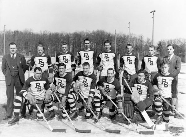 Penn State Varsity Hockey Team, 1940-41. Standing: Dr. A.F. Davis (coach), Ed Maslow, Burt Anthony, George Kaiser, Bill Garrett, Mike Fedock, Kirk Herrick, Dick May (manager). Kneeling: Peany Gates, John Dufford, Art Fowler, George Wolbert (captain), Wayne Bitner, Earl Johnson. Penn State University Archives, Paterno Library