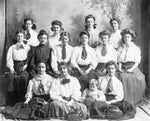 Penn State Women’s fencing team, circa 1906. Left to right, top row: Carolyn Buckhart, Alverra Martin, Millicent Pond, Bess Brown. Middle row: Clara Pond, Florence Benedict, Anne Keichline, Laura Harrison, Nettie Cook, Mary Louise Hackel. Bottom row: Eleanor Walsh, Mary Kathryn Jackman, Gertrude Walsh, child is the daughter of Mr. Higby, teacher of mathematics. Penn State University Archives, Paterno Library