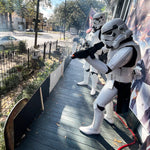 The ‘Star Wars’-themed house float on Opelousas Street, where Stormtrooper Mike Wolanski playfully aimed a blaster at passing kids and posed for pictures, was especially popular. Doug MacCash / The Times-Picayune | The Advocate